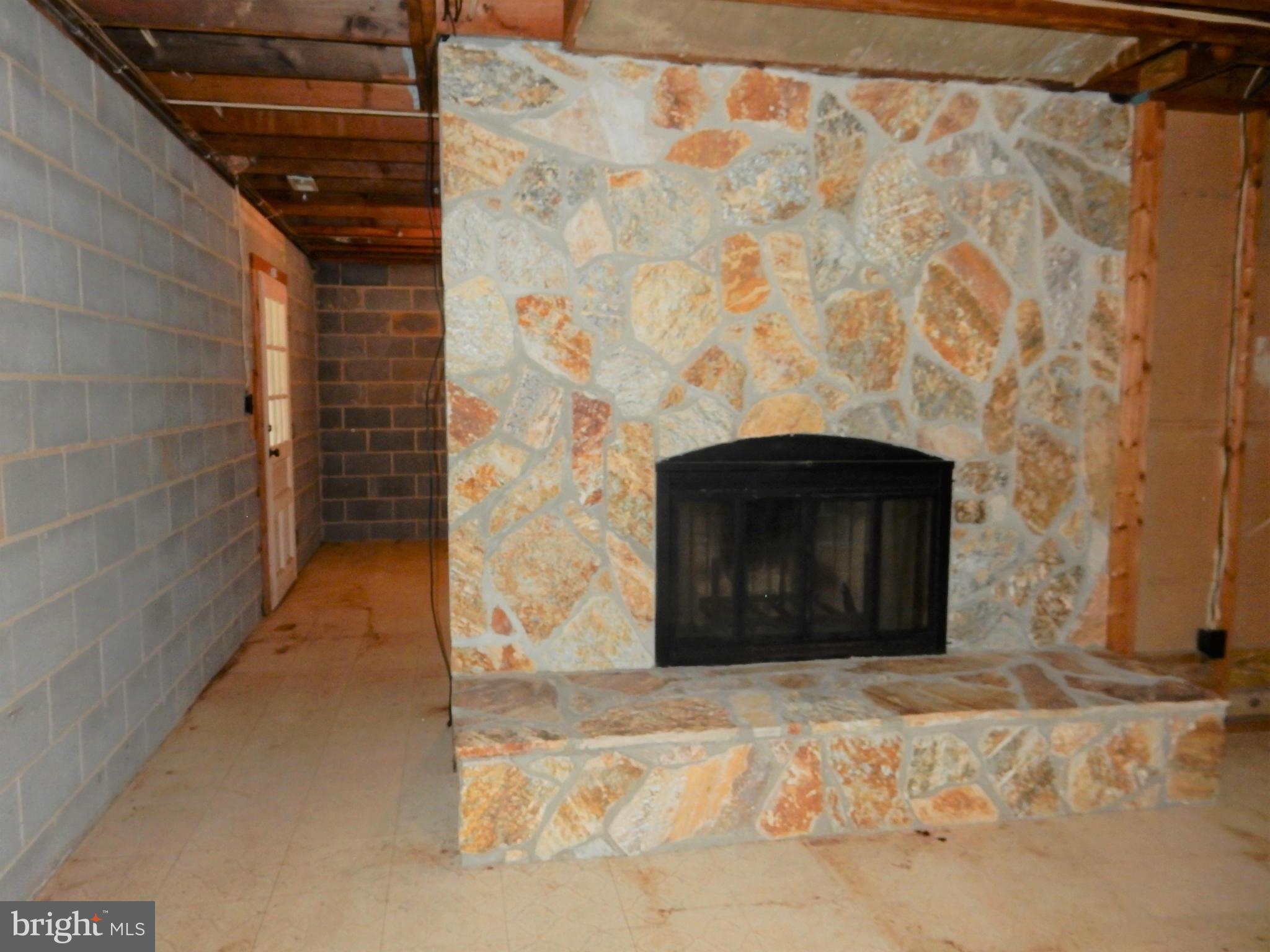 11311 Stuart Mill Road Oakton, VA 22124 - Photo 21 of 30 Stone fireplace in Lower Level