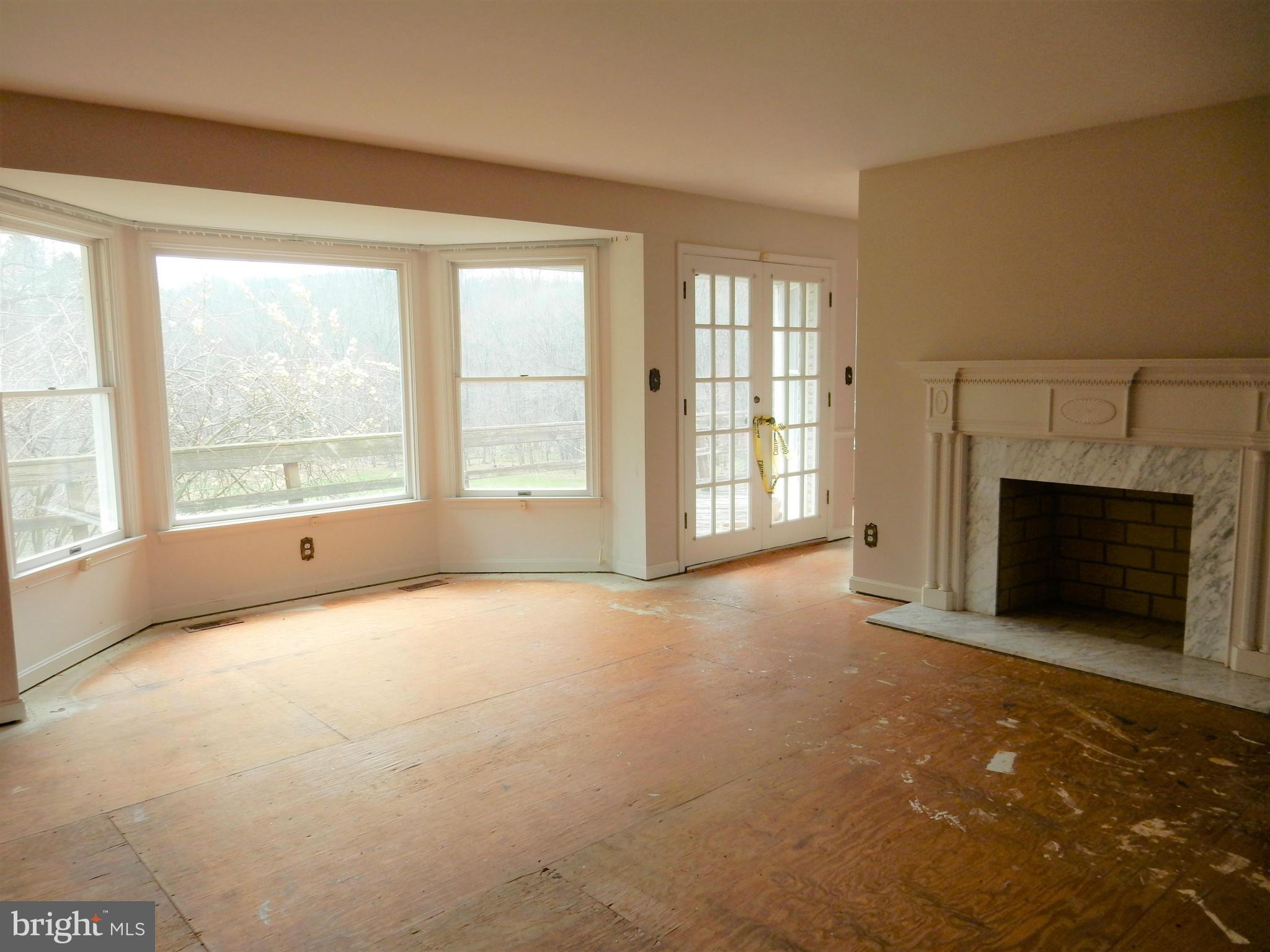 Living Room with bay window and fireplace