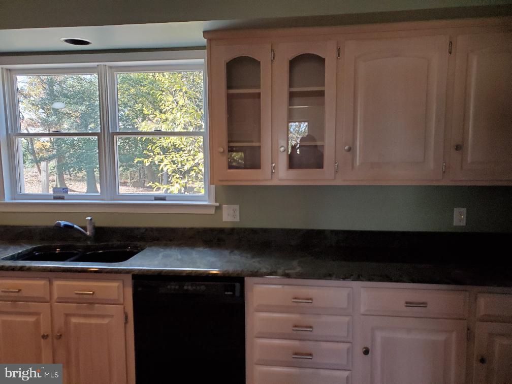 9368 Clendaniel Pond Road Lincoln, DE 19960 - Photo 27 of 58 Granite counter tops and lots of natural light