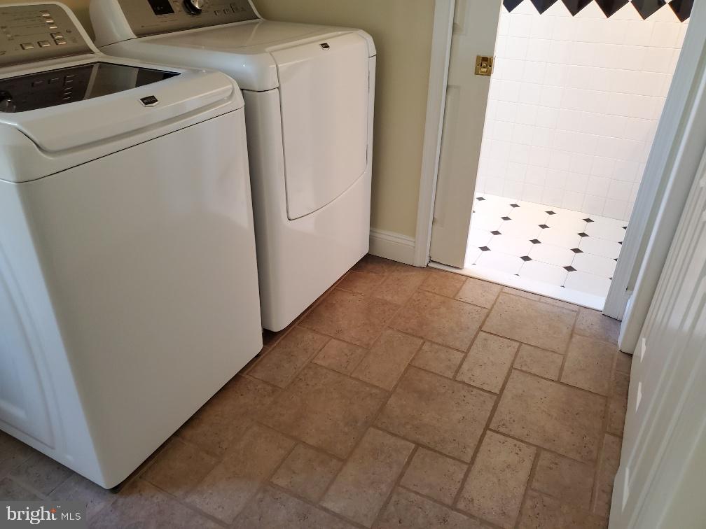 9368 Clendaniel Pond Road Lincoln, DE 19960 - Photo 34 of 58 Laundry on 1st floor with ceramic tile flooring