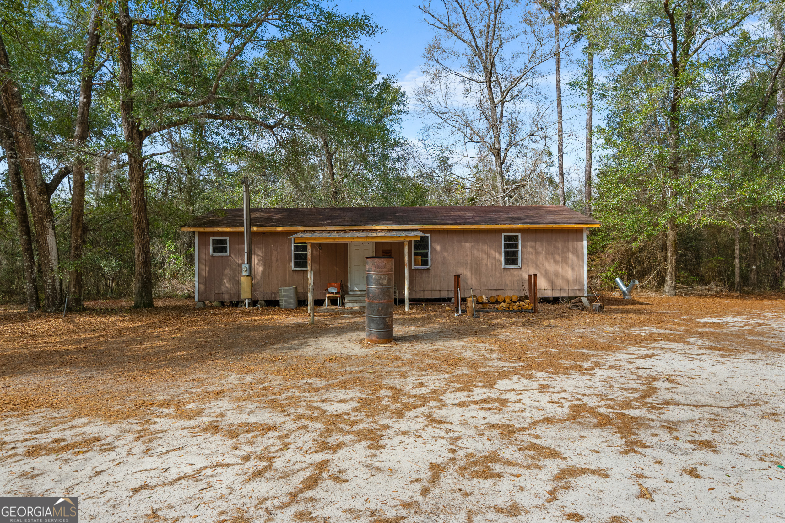 1000 Old River Road South Brooklet, GA 30415 - Photo 45 of 55 a view of a house with backyard and trees