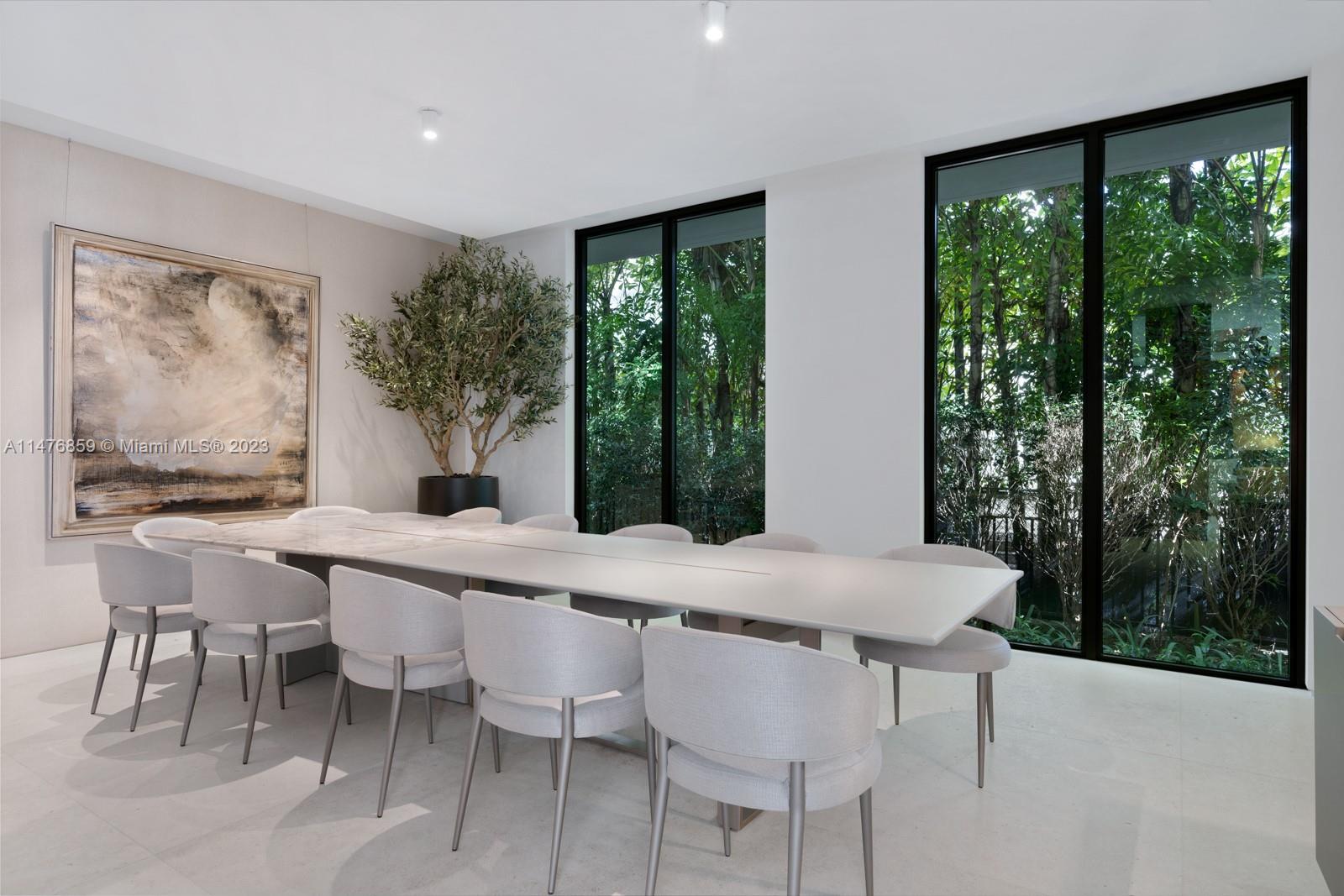 40 Palm Avenue Miami Beach, FL 33139 - Photo 12 of 62 a view of a dining room with furniture window and outside view