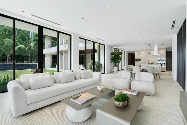 front view of a building with a garden