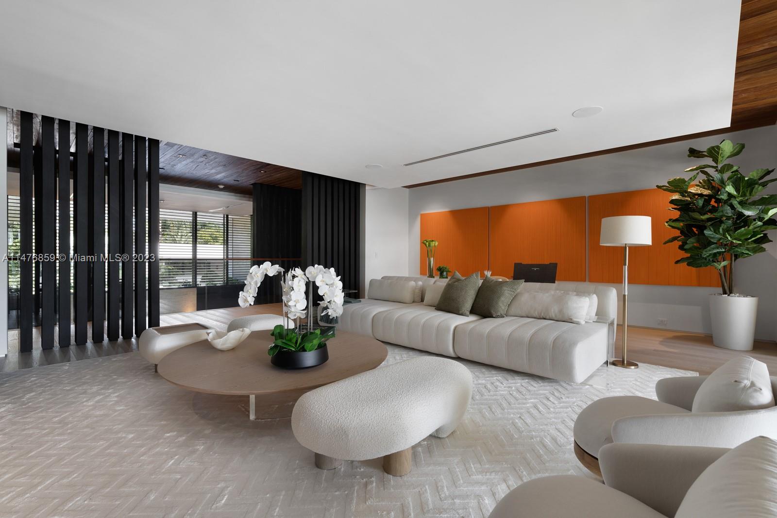 40 Palm Avenue Miami Beach, FL 33139 - Photo 26 of 62 a living room with furniture potted plant and a large window