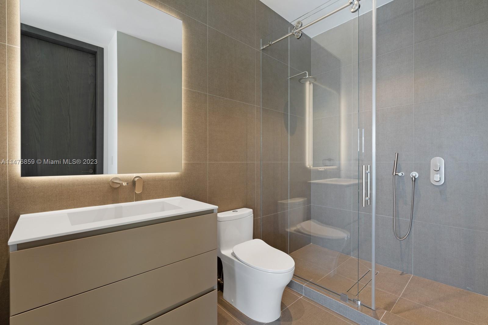 40 Palm Avenue Miami Beach, FL 33139 - Photo 37 of 62 a bathroom with a sink toilet and shower