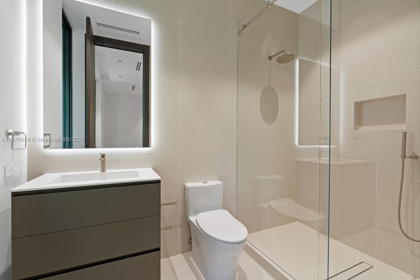 40 Palm Avenue Miami Beach, FL 33139 - Photo 39 of 62 a bathroom with a toilet sink and shower