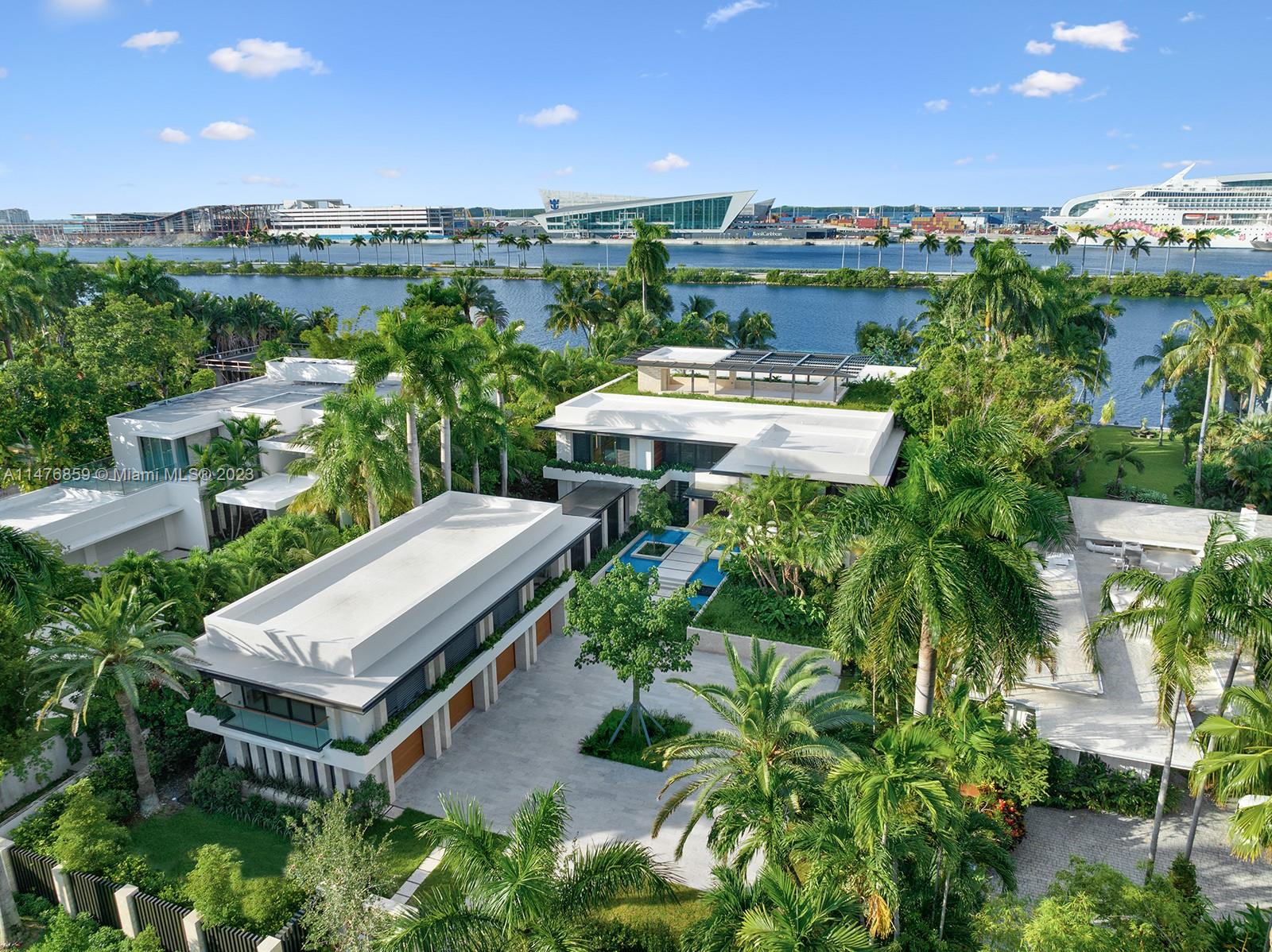 40 Palm Avenue Miami Beach, FL 33139 - Photo 4 of 62 a aerial view of a house with a garden and lake view