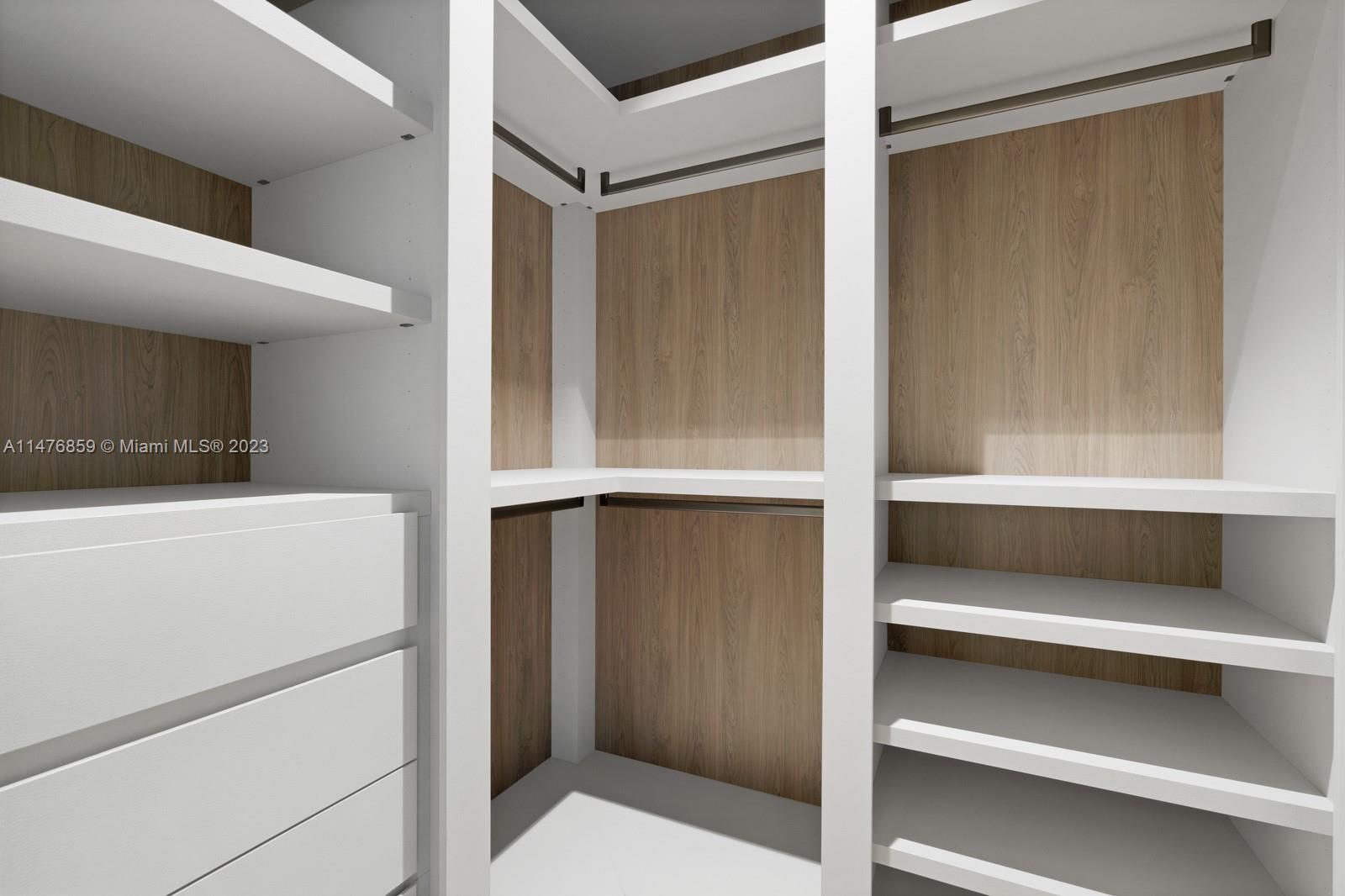 40 Palm Avenue Miami Beach, FL 33139 - Photo 45 of 62 a view of walk in closet with empty racks