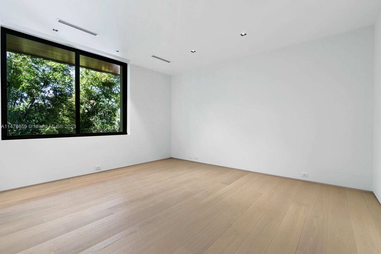 40 Palm Avenue Miami Beach, FL 33139 - Photo 47 of 62 an empty room with large windows