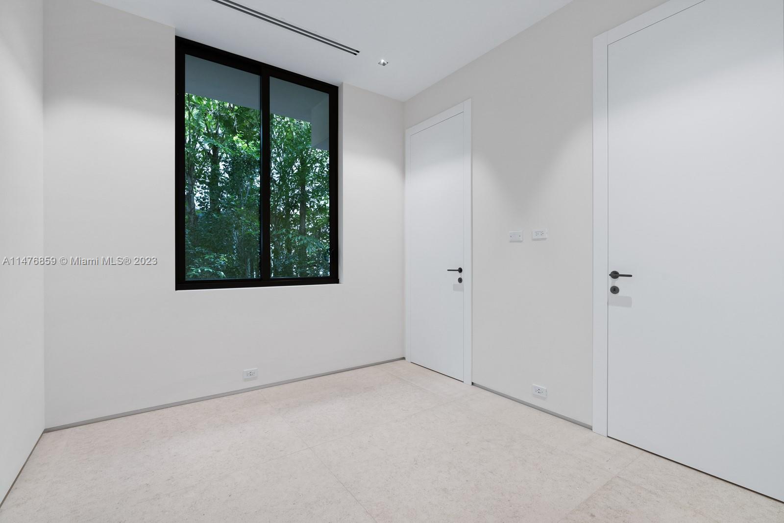 40 Palm Avenue Miami Beach, FL 33139 - Photo 54 of 62 a view of an empty room with a window