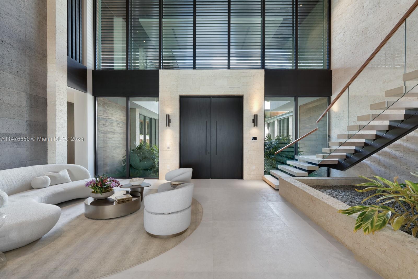 40 Palm Avenue Miami Beach, FL 33139 - Photo 7 of 62 a lobby with furniture and a potted plant