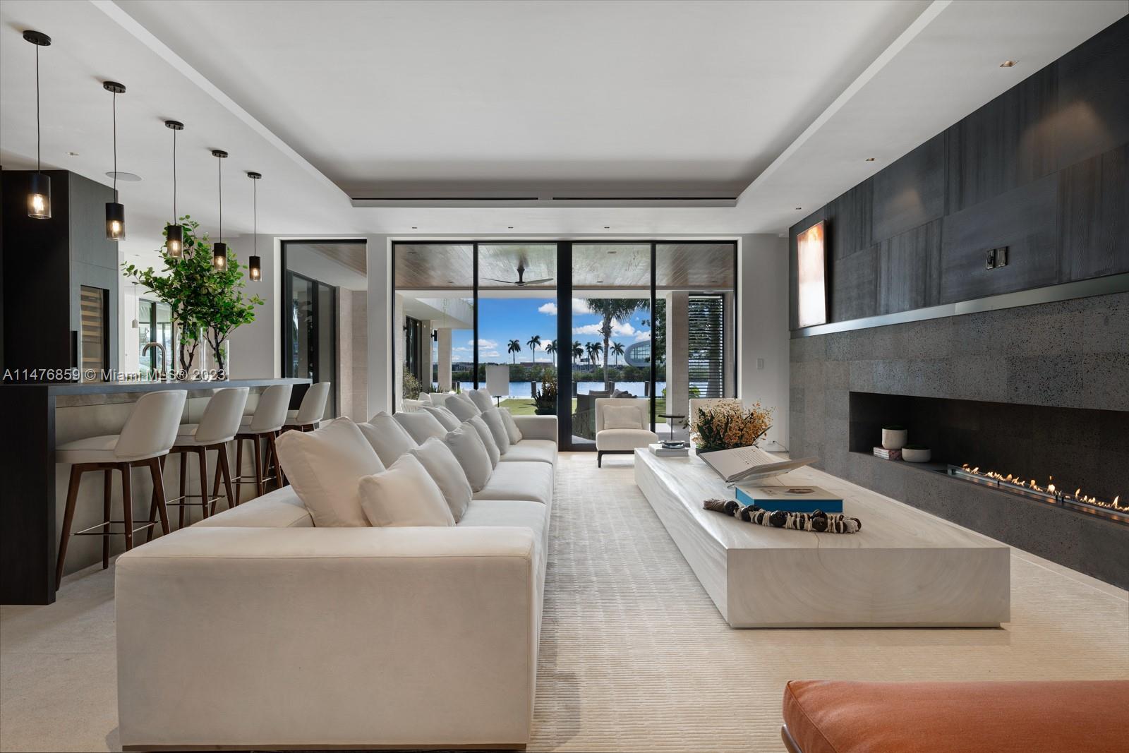 40 Palm Avenue Miami Beach, FL 33139 - Photo 10 of 62 a living room with furniture and a fireplace