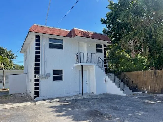 a front view of a house with a garage