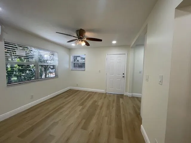 a view of an empty room with a window