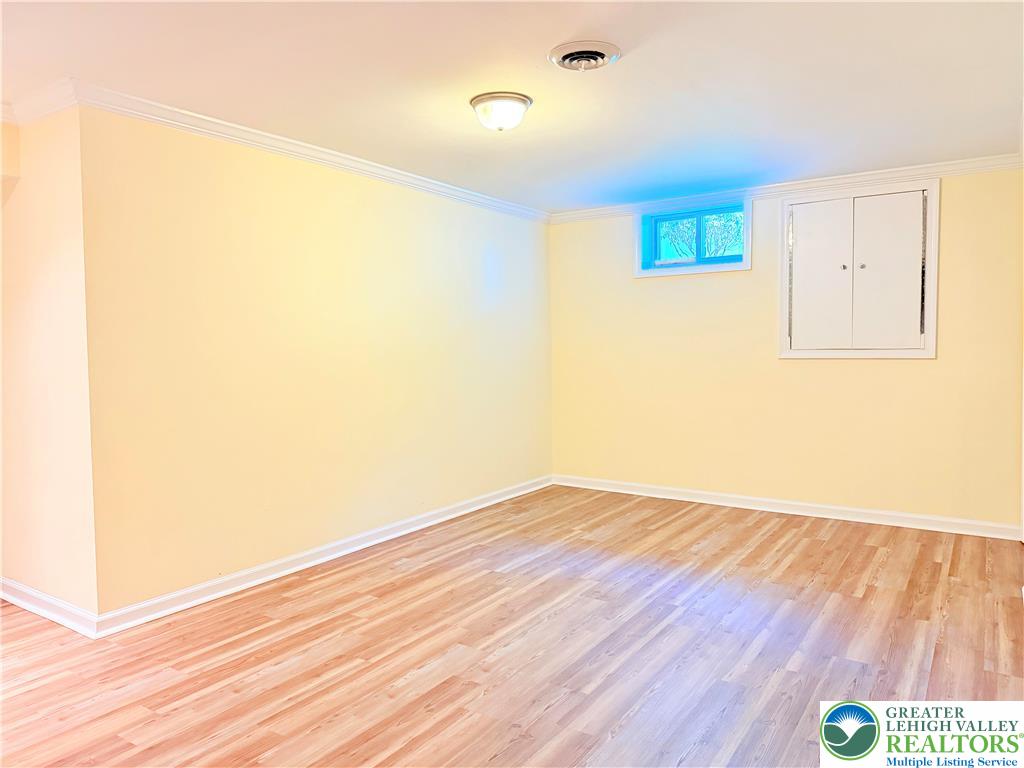 4165 Alder Road Bethlehem, PA 18020 - Photo 32 of 42 a view of an empty room with wooden floor