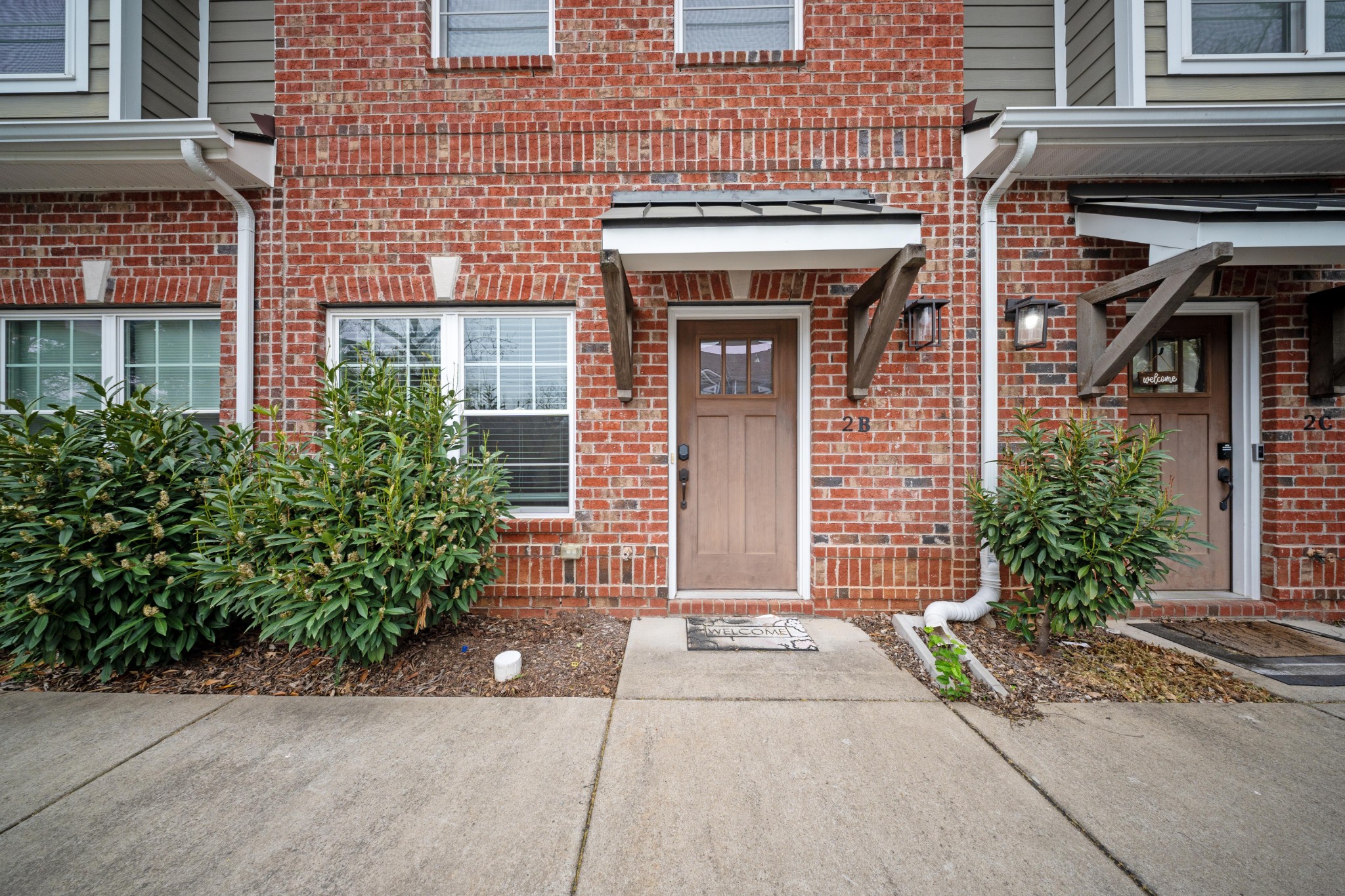 1019 North Maple Street, Unit 2B Murfreesboro, TN 37130 - Photo 1 of 26 front view of a brick house