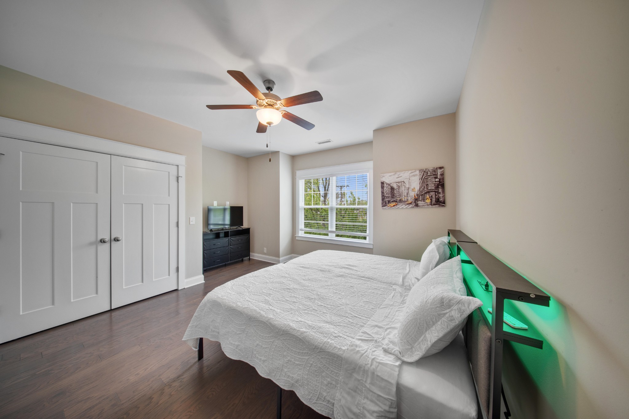1019 North Maple Street, Unit 2B Murfreesboro, TN 37130 - Photo 13 of 26 a bedroom with a bed and a window
