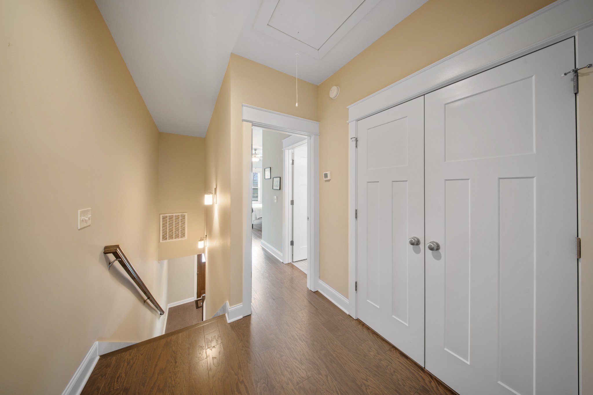 1019 North Maple Street, Unit 2B Murfreesboro, TN 37130 - Photo 16 of 26 a view of a hallway with wooden floor and staircase