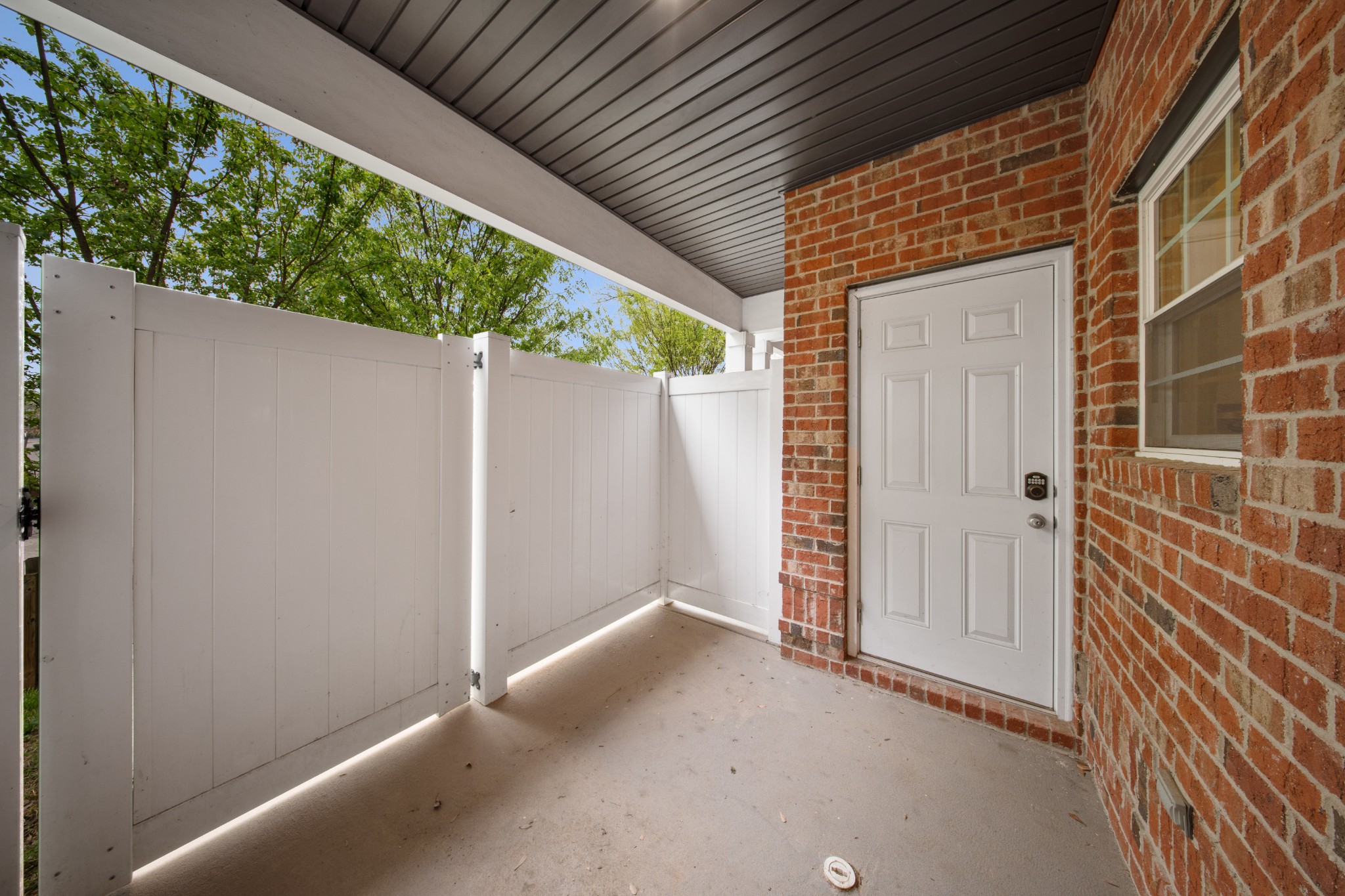 1019 North Maple Street, Unit 2B Murfreesboro, TN 37130 - Photo 25 of 26 a view of a house with a porch