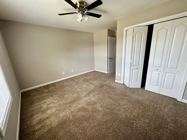 a view of a back yard of the house