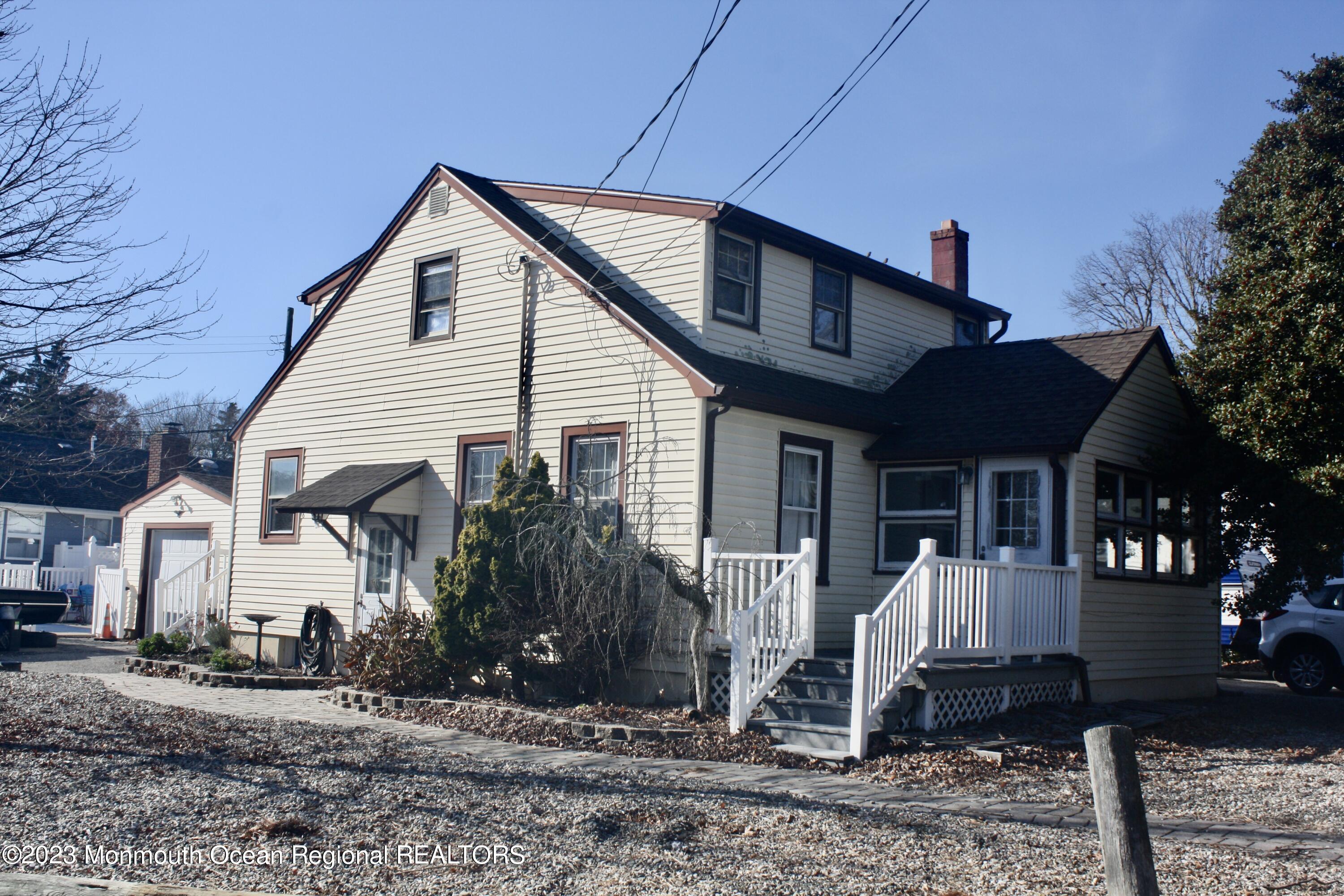 34 Hulse Landing Road Brick, NJ 08723 - Photo 1 of 40 a front view of a house with garden