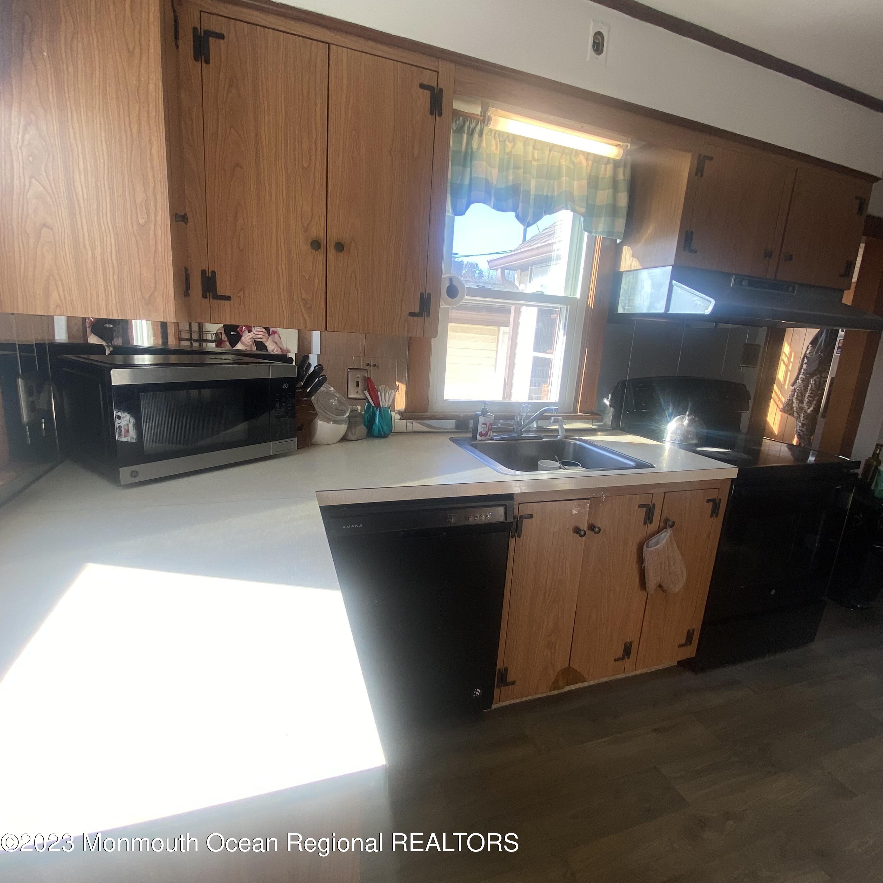 34 Hulse Landing Road Brick, NJ 08723 - Photo 13 of 40 a kitchen with a sink and cabinets