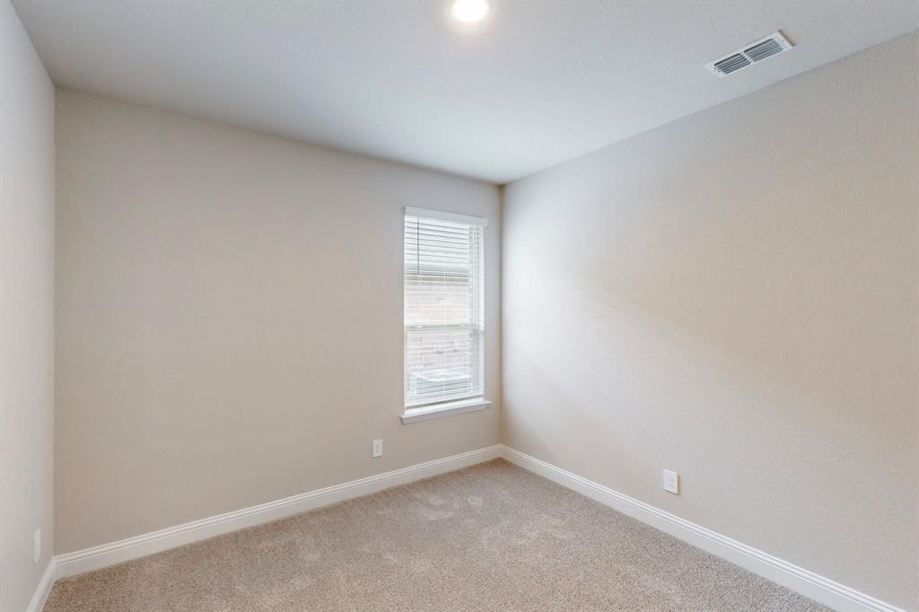 3017 Hampton Path Argyle, TX 76226 - Photo 25 of 37 an empty room with windows