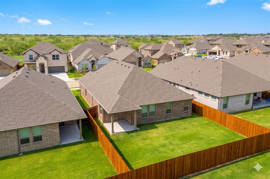 3017 Hampton Path Argyle, TX 76226 - Photo 37 of 37 an aerial view of a house with a backyard