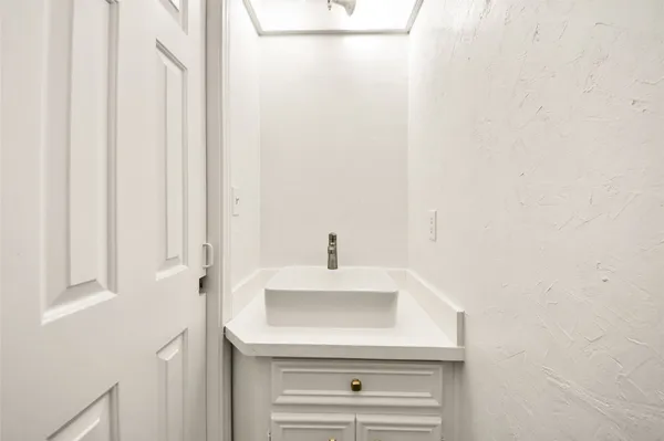 a sink with a mirror