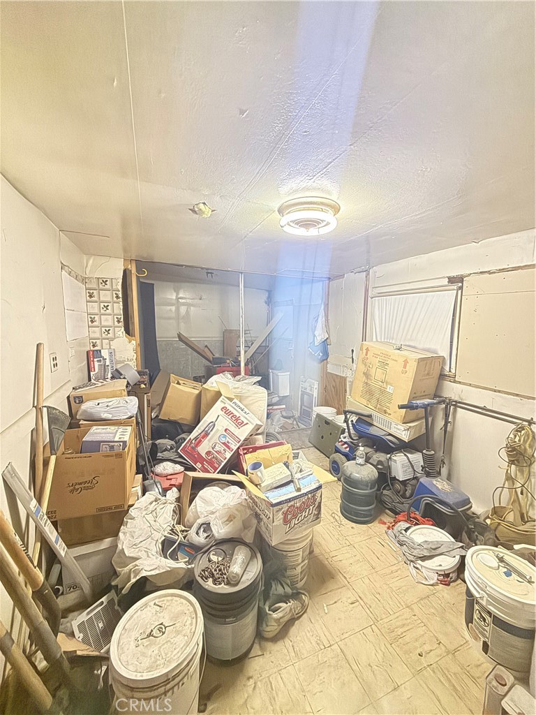 82480 3rd Street Trona, CA 93562 - Photo 13 of 15 a living room with furniture and a table