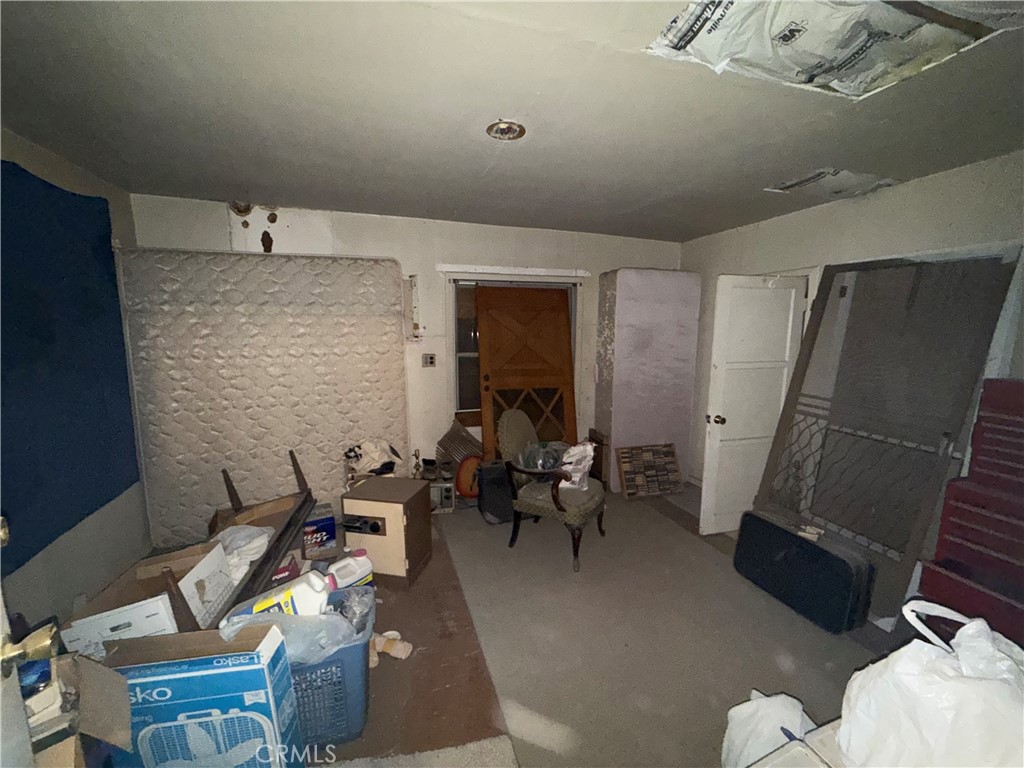 82480 3rd Street Trona, CA 93562 - Photo 14 of 15 a living room with furniture and a rug