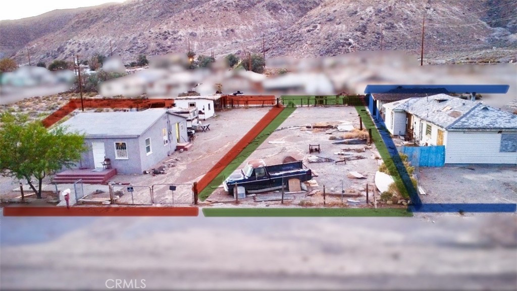 82480 3rd Street Trona, CA 93562 - Photo 2 of 15 an aerial view of a house with a garden and trees