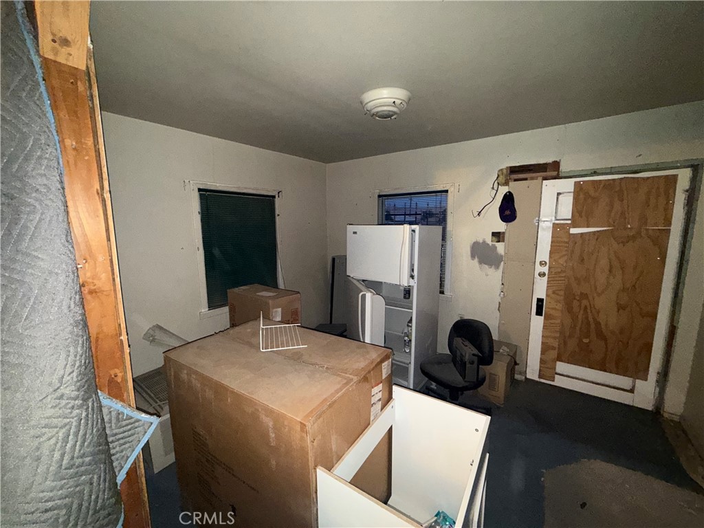 82480 3rd Street Trona, CA 93562 - Photo 10 of 15 a dining room with furniture and a window