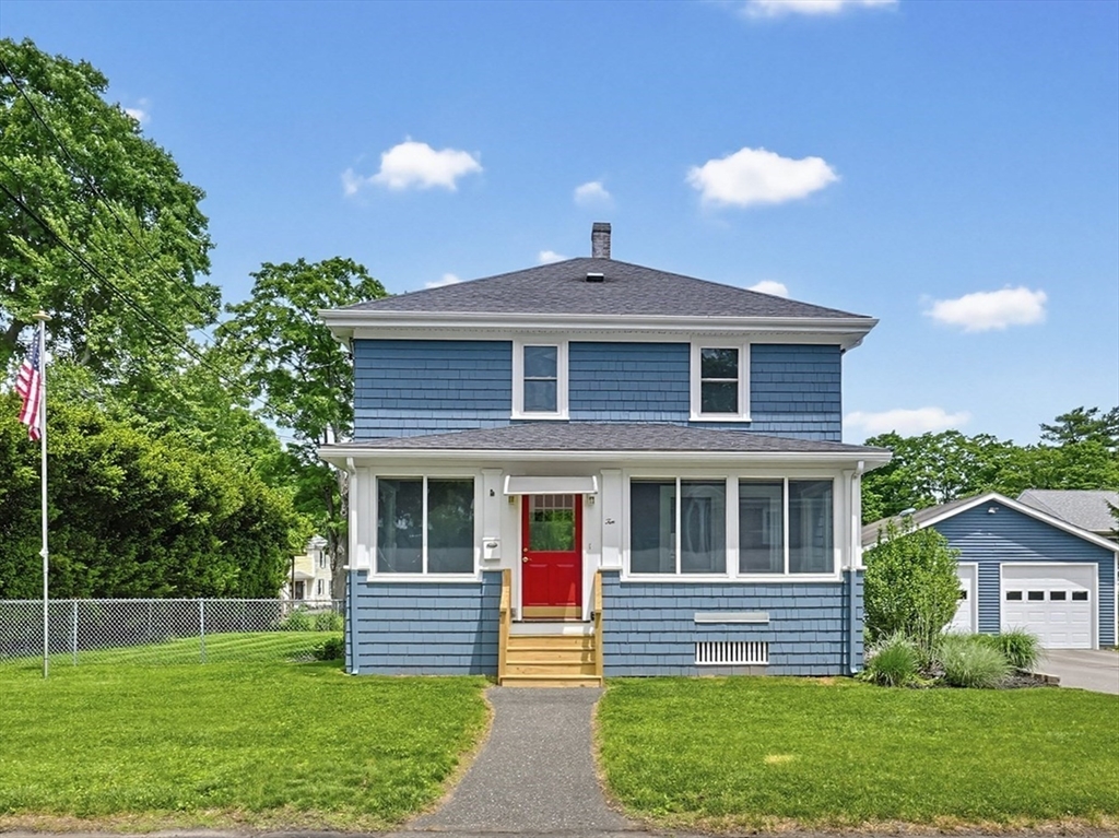 10 Water Street Natick, MA 01760 - Photo 1 of 35 a front view of a house with a yard