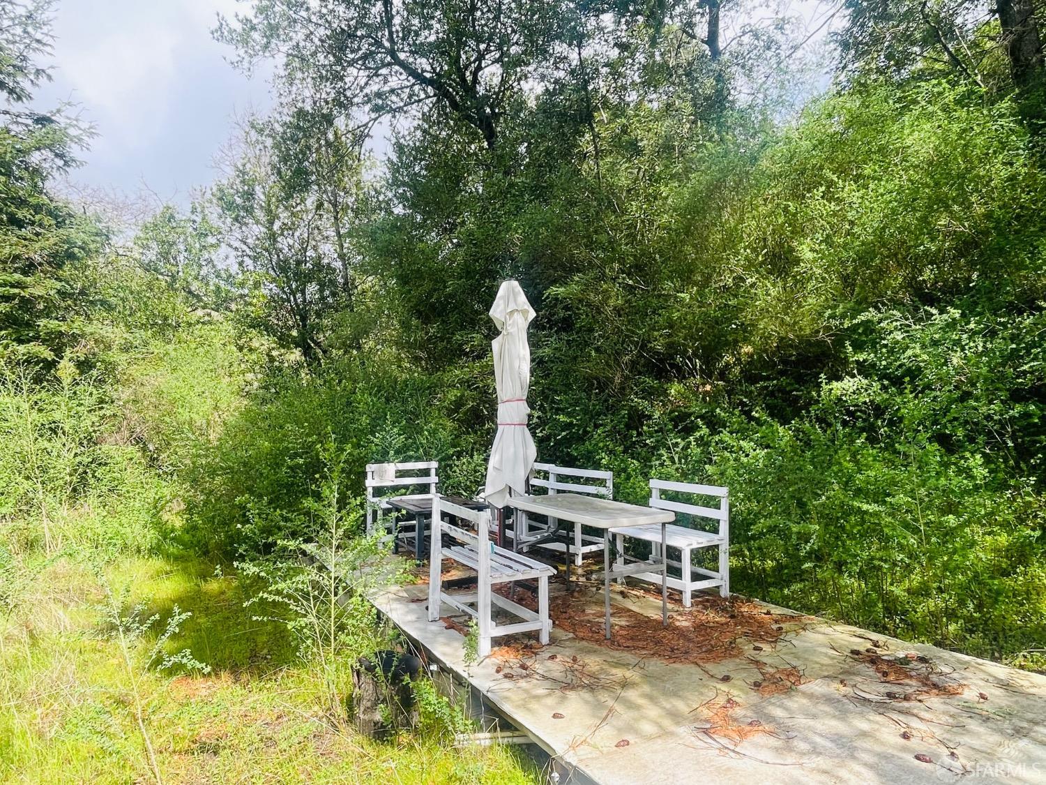 0 Sunset View Road Los Gatos, CA 95033 - Photo 12 of 25 a view of a chairs and table in patio