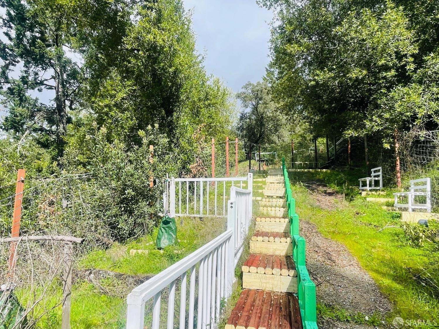 0 Sunset View Road Los Gatos, CA 95033 - Photo 13 of 25 a view of swimming pool with a garden and deck