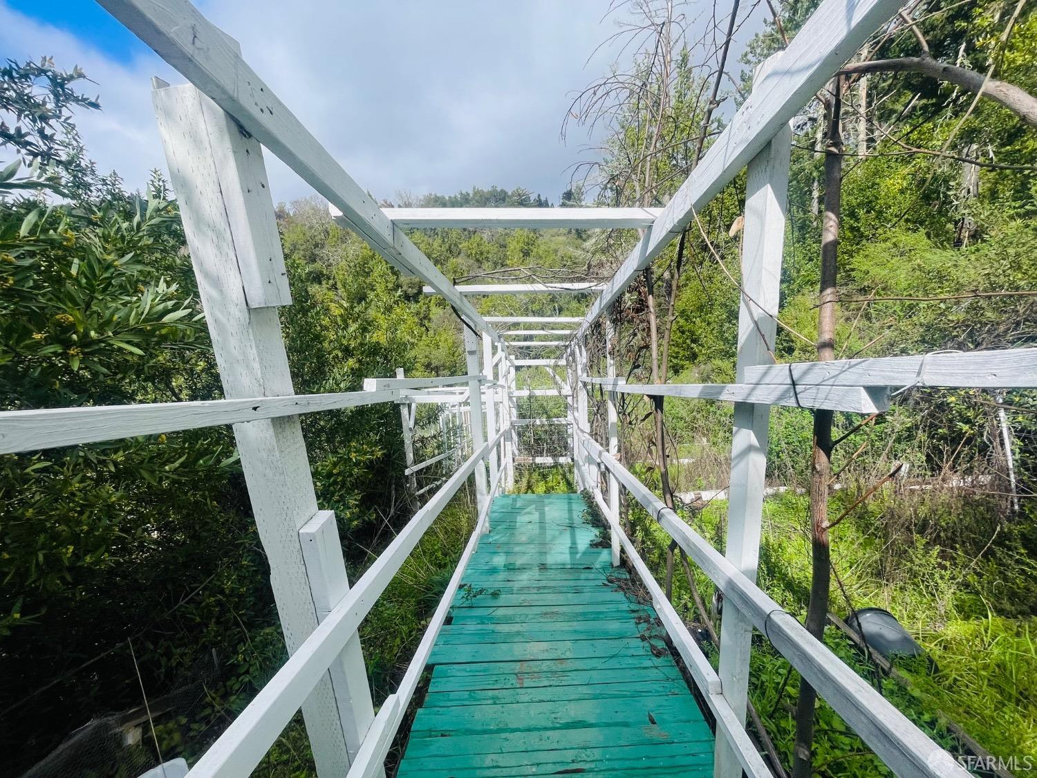0 Sunset View Road Los Gatos, CA 95033 - Photo 19 of 25 a view of balcony with wooden floor and fence
