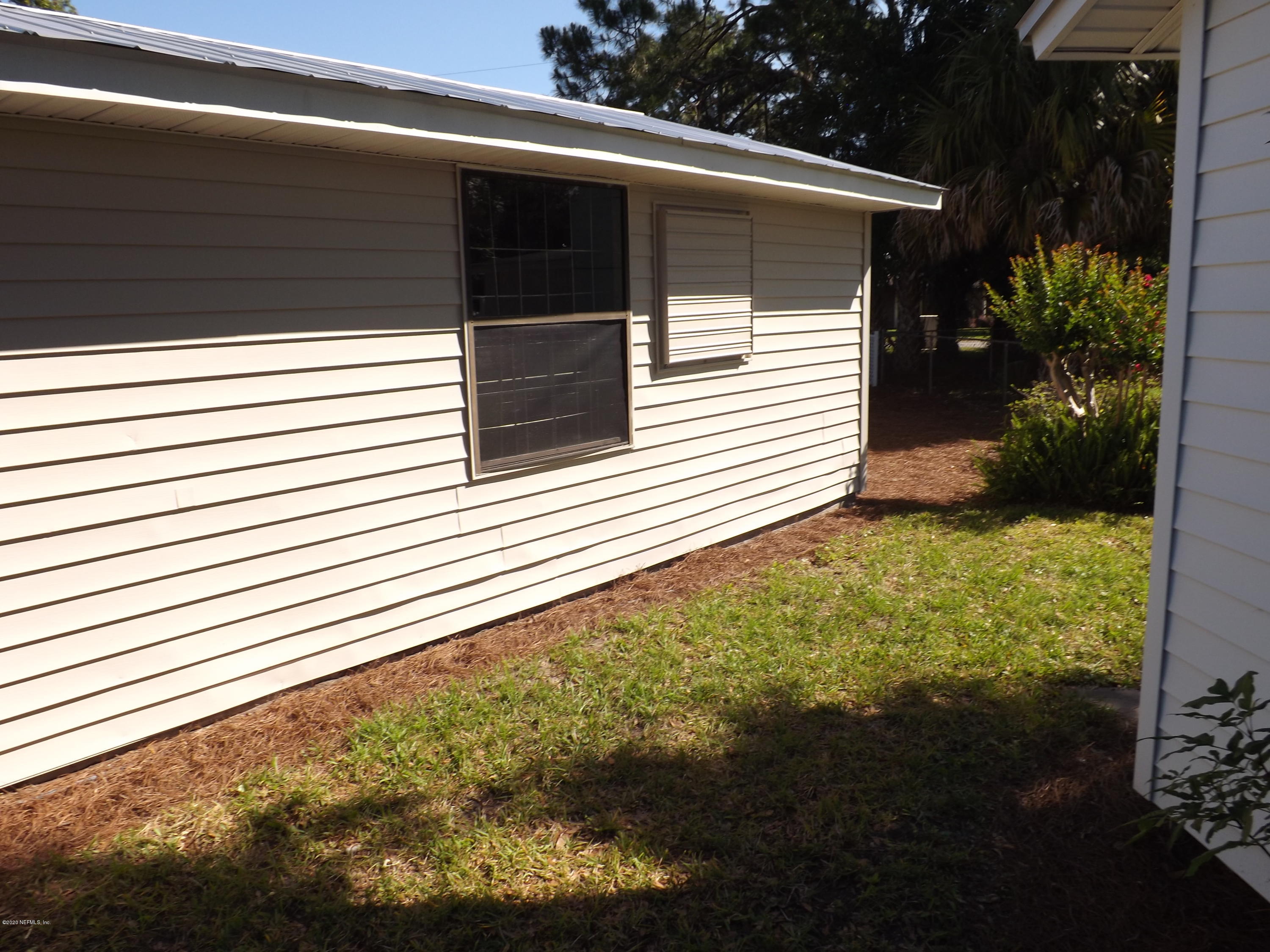 3565 Rogero Road Jacksonville, FL 32277 - Photo 46 of 74 a view of a backyard