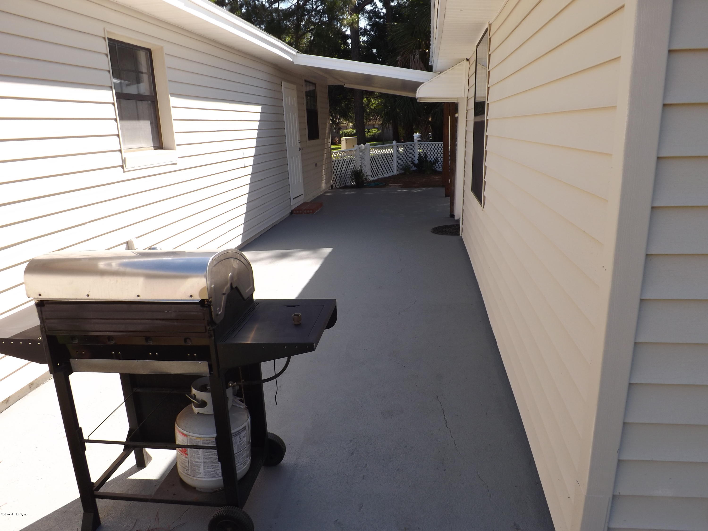 3565 Rogero Road Jacksonville, FL 32277 - Photo 49 of 74 a view of balcony and patio