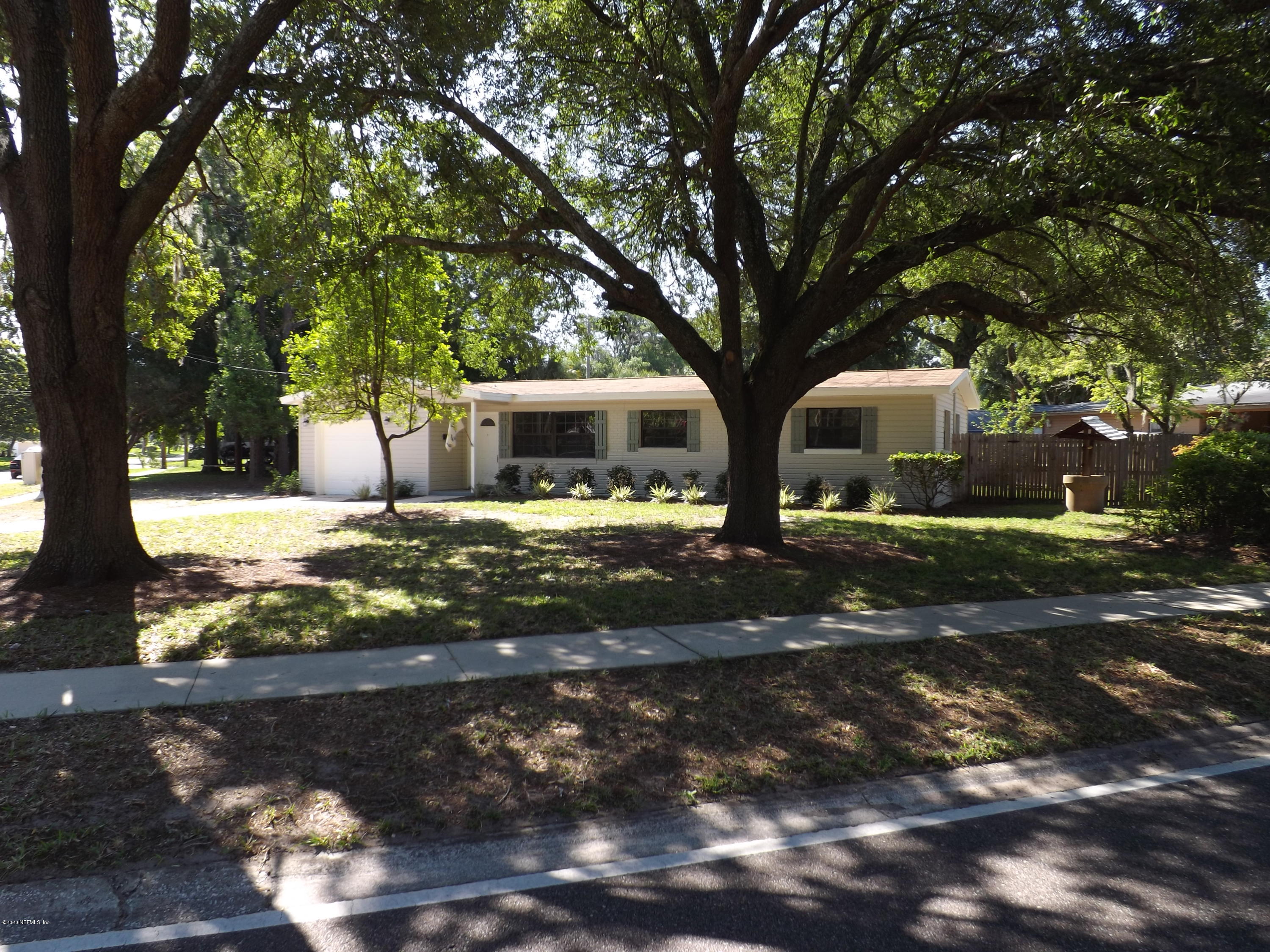 3565 Rogero Road Jacksonville, FL 32277 - Photo 52 of 74 a front view of a house with garden