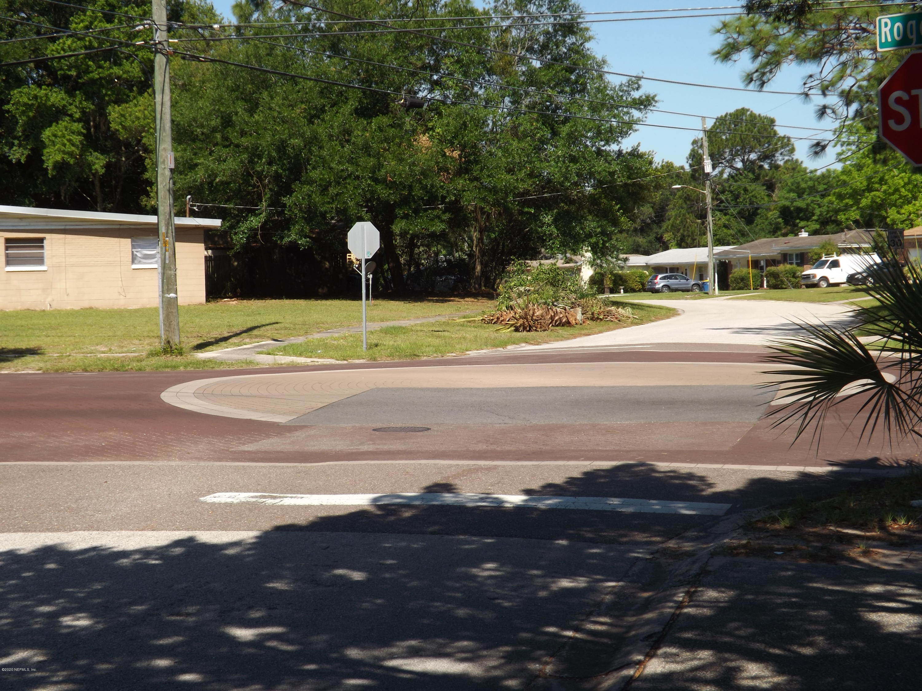 3565 Rogero Road Jacksonville, FL 32277 - Photo 59 of 74 a view of a street with houses