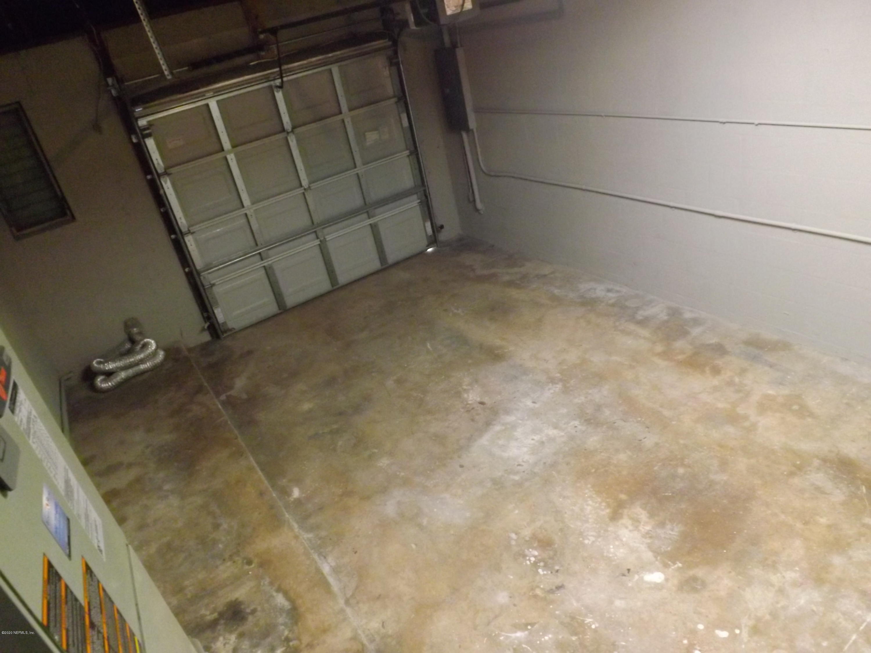 3565 Rogero Road Jacksonville, FL 32277 - Photo 72 of 74 a bathroom with a shower