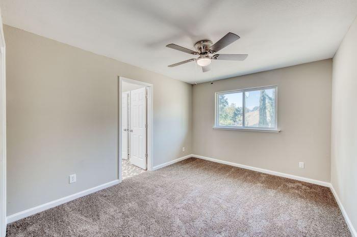 6153 Big Oak Road Sanger, CA 93657 - Photo 16 of 23 a view of an empty room with a window