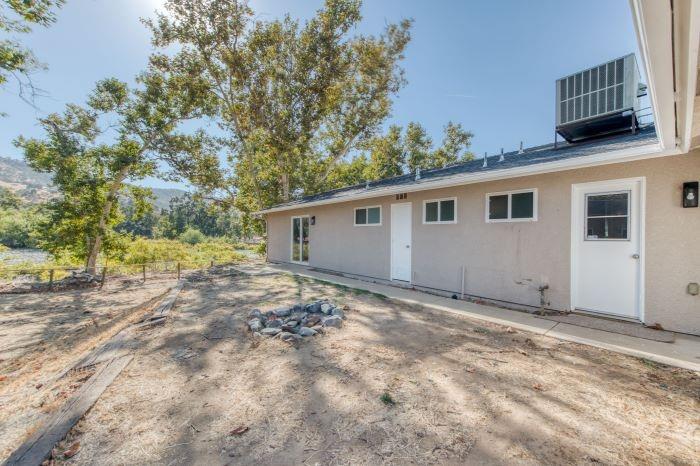 6153 Big Oak Road Sanger, CA 93657 - Photo 23 of 23 a view of a house with a tree