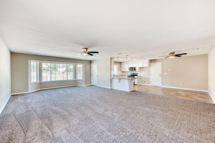 6153 Big Oak Road Sanger, CA 93657 - Photo 5 of 23 a view of empty room with windows