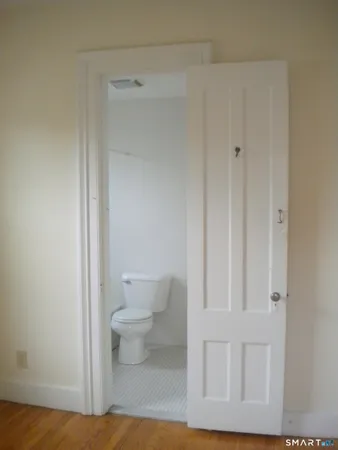a bathroom with a shower and a sink