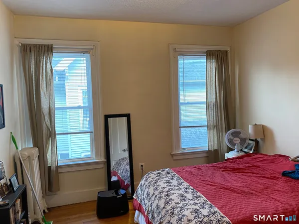 a view of an empty room and window