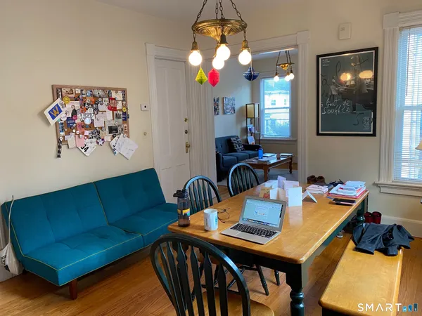 a living room with furniture and a window