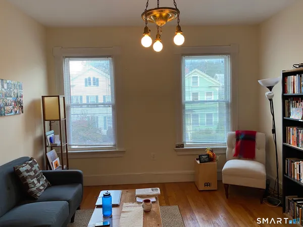 a kitchen with a refrigerator and a stove
