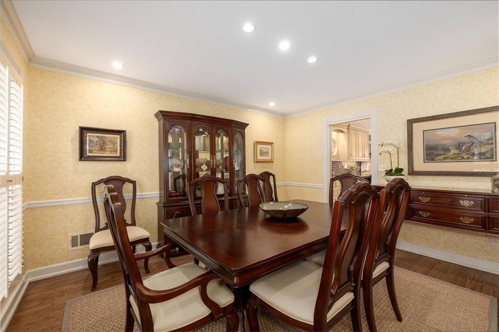 4890 Forestglade Court Smoke Rise, GA 30087 - Photo 12 of 50 a view of a dining room with furniture and window